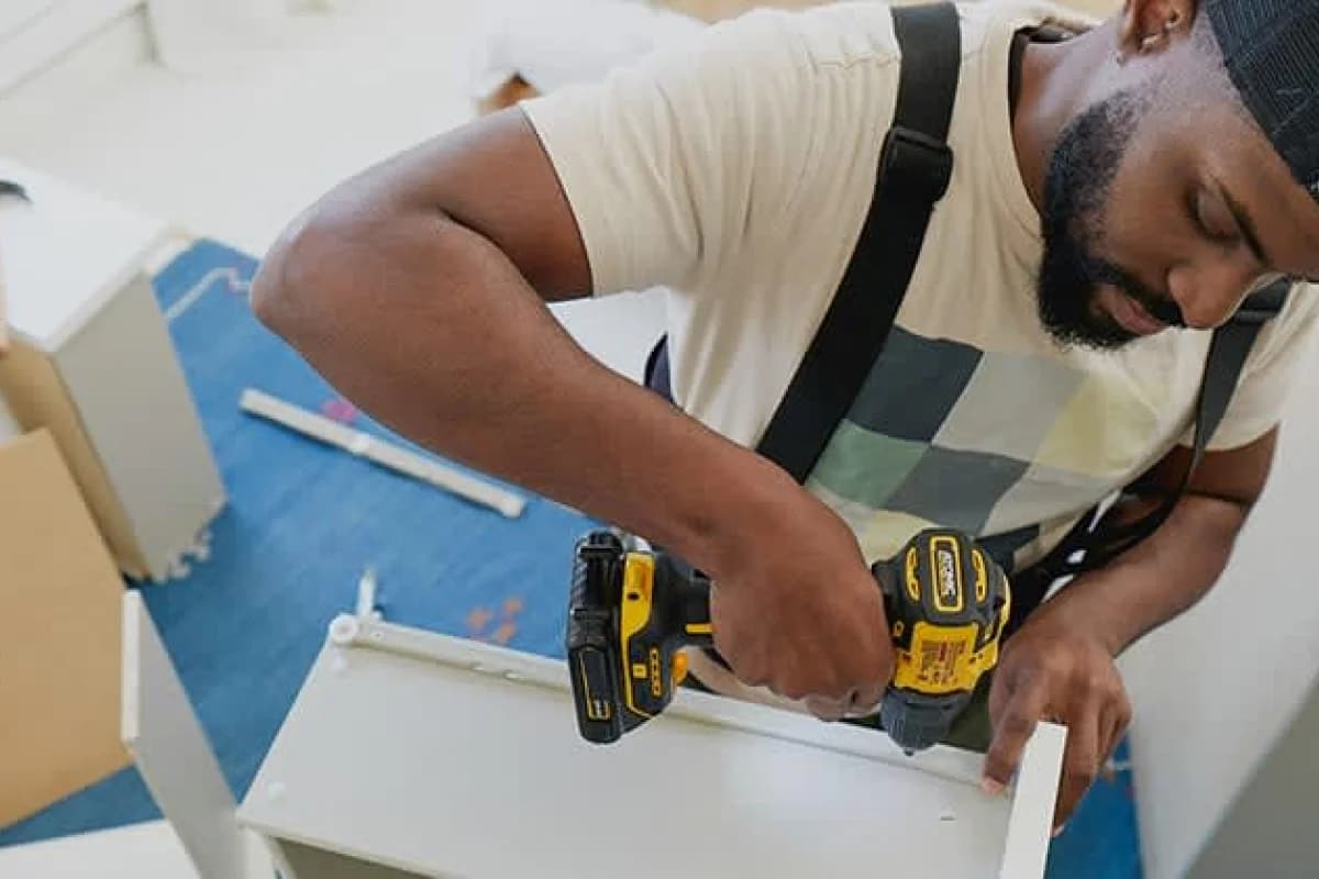 Professional handyman carrying out home repairs in a London property